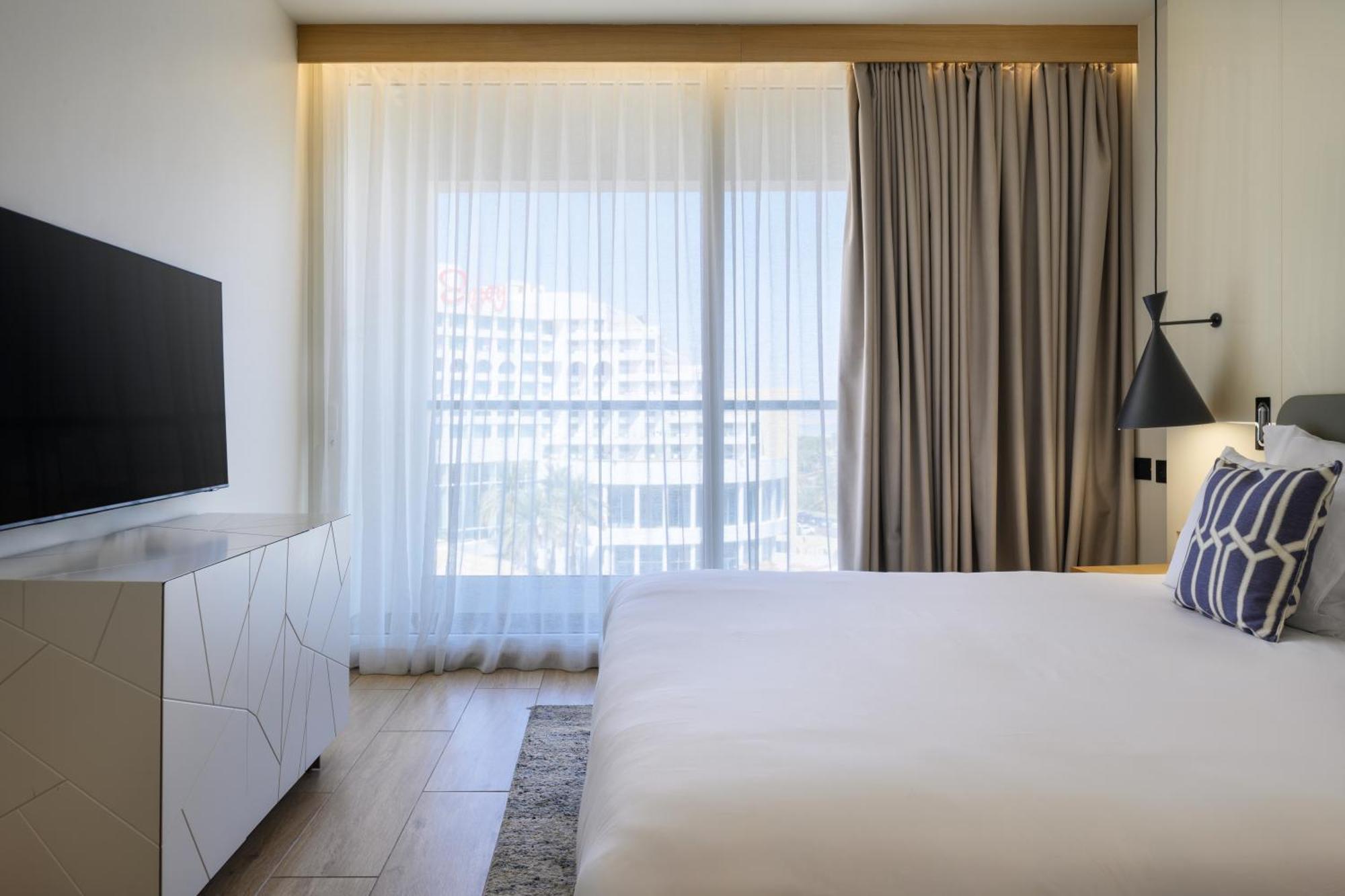 Nevo By Isrotel Collection Ein Bokek Exterior foto A bedroom at the Hilton San Diego Bayfront